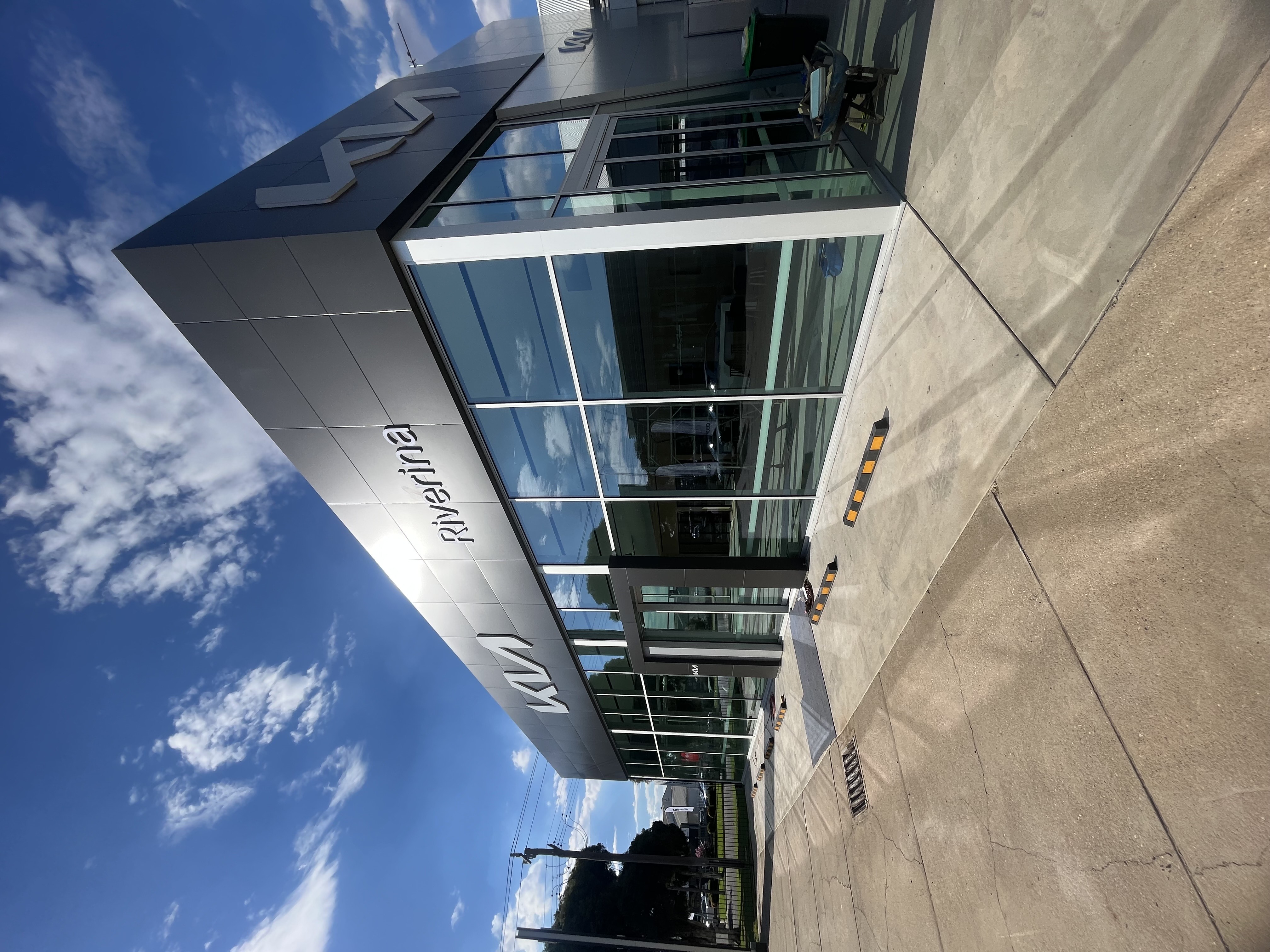 Kia dealership exterior cleaned by Fresko Cleaning